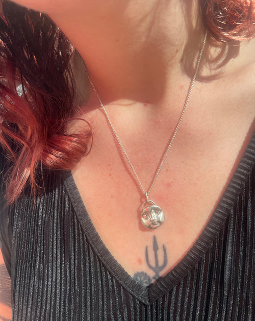 Moon Faced Pendant